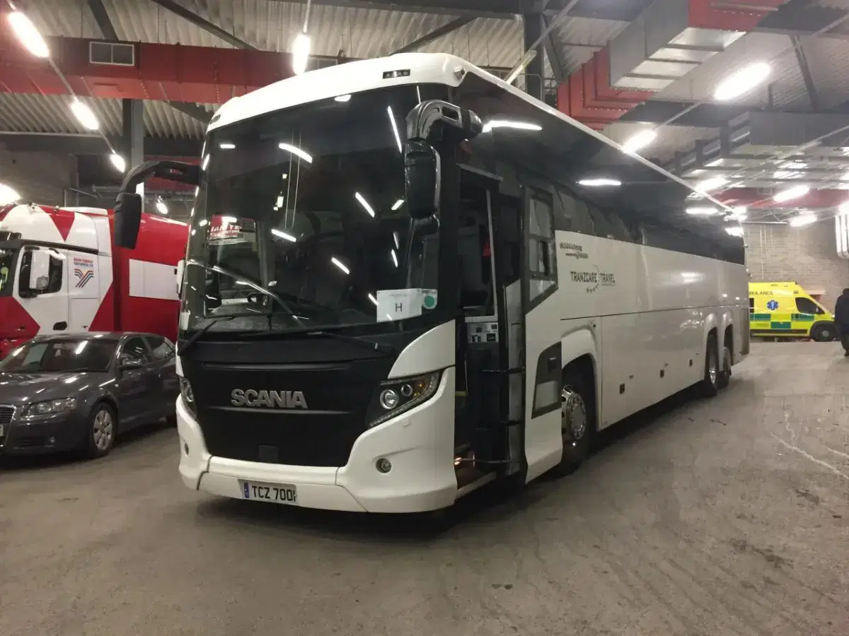 Front view of a 57-seater Tranzcare large coach built on a modern, low-emission Euro 6 compliant chassis.